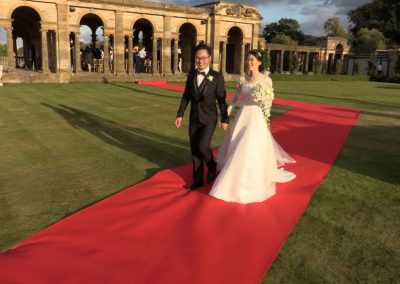 Yang and Chengyang on Hever Castle's red carpet